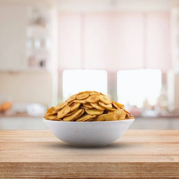 HOME DELITE BLACK PEPER BANANA CHIPS 90 GM